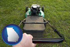 georgia map icon and using a power lawn mower to maintain the appearance of a lawn