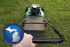 michigan map icon and using a power lawn mower to maintain the appearance of a lawn