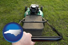 north-carolina map icon and using a power lawn mower to maintain the appearance of a lawn