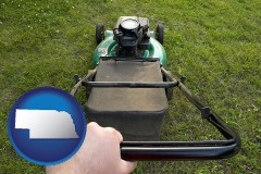nebraska map icon and using a power lawn mower to maintain the appearance of a lawn