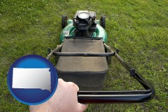 south-dakota map icon and using a power lawn mower to maintain the appearance of a lawn