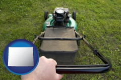 wyoming map icon and using a power lawn mower to maintain the appearance of a lawn