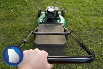 using a power lawn mower to maintain the appearance of a lawn - with Georgia icon
